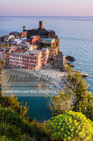 Sunset over Vernazza, wonderful town in the Cinque Terre National Park, Italy