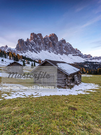 Huts with Odle on the background. Val di Funes, Trentino Alto Adige, Italy.