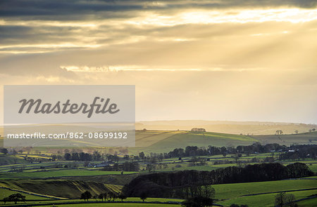 England, Derbyshire, Peak District. The rolling green hills of the Peak Disrict in evening light.