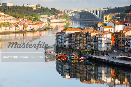 Portugal, Douro Litoral, Porto. An early morning view of the UNESCO World Heritage listed Ribeira district.