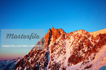 Europe, France, Haute Savoie, Rhone Alps, Chamonix, Aiguille du Midi sunset