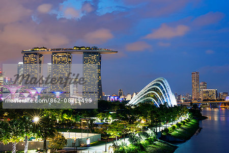 South East Asia, Singapore, Gardens by the Bay, the Cloud Forest and Marina Bay Sands Hotel and Casino South East Asia, Singapore, Gardens by the Bay, the Cloud Forest and Marina Bay Sands Hotel and Casino