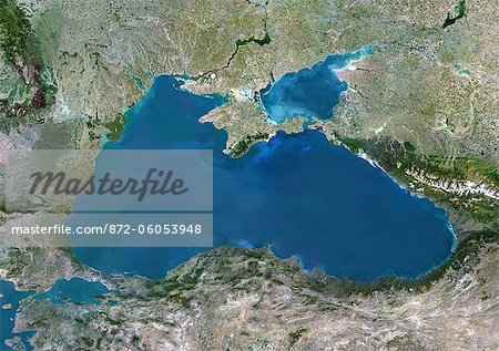 Black Sea, Europe, True Colour Satellite Image. True colour satellite image of the Black Sea, an inland sea bounded by Europe, Anatolia and the Caucasus. It lies between Bulgaria, Georgia, Romania, Russia, Turkey and Ukraine. The Black Sea connects to the Sea of Azov (at top). The Bosphorus strait connects it to the Sea of Marmara (down left). Composite image using LANDSAT 5 data.
