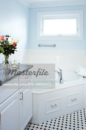 Filled soaking tub with running water and candles, Maine Stay Inn, Kennebunkport, ME.