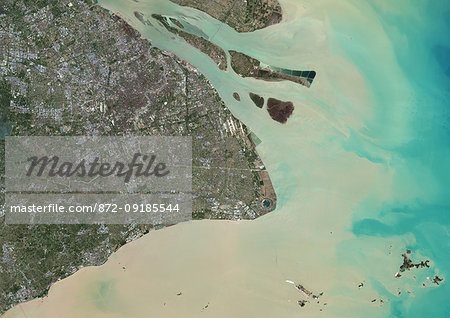 Color satellite image of Shanghai, China. The city is located in the Yangtze River Delta. Image collected on April 29, 2017 by Sentinel-2 satellites. Color satellite image of Shanghai, China. The city is located in the Yangtze River Delta. Image collected on April 29, 2017 by Sentinel-2 satellites.
