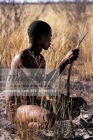 Bushman Hunter Sitting in Field Namibia, Africa