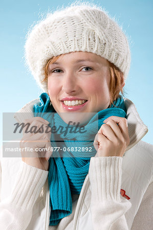 Portrait of woman on light blue background