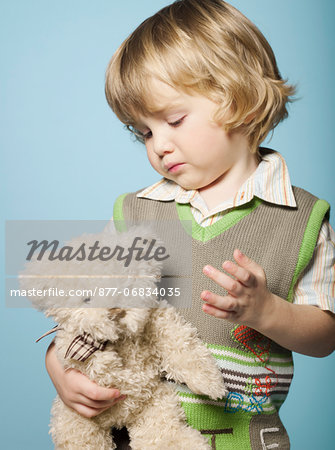 Little boy with stuffed toy