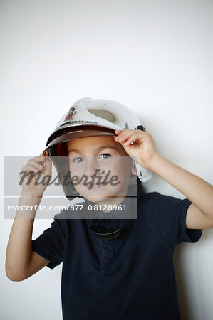 Little boy dressed up as a fireman