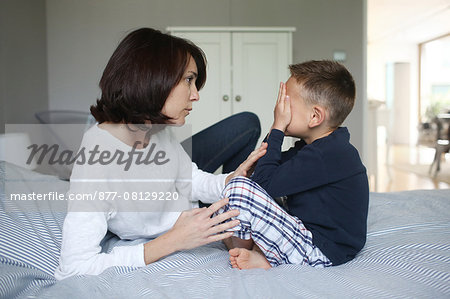 A mom consoling her 5 years old son
