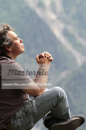 Pilgrim praying. France.