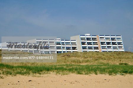 France, Pays de la Loire, Vendee, Saint-Jean-de-Monts, buildings on the seafront behind the dune