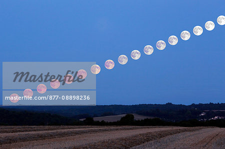 France, Seine et Marne, Provins. Biggest full moon of the year 2014. (super moon 2014). Image taken on August 10th 2014 in the evening. Rosary showing the moonrise.