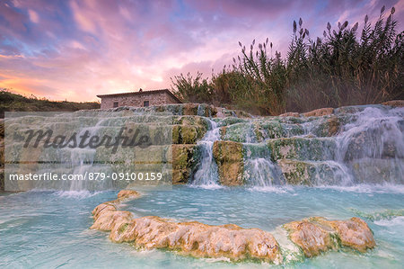 Sunset at termal Waterfall Mill of Saturnia. Waterfall Mill(Cascata del Mulino),Saturnia,Manciano, Grosseto province, Tuscany, Italy, Europe Sunset at termal Waterfall Mill of Saturnia. Waterfall Mill(Cascata del Mulino),Saturnia,Manciano, Grosseto province, Tuscany, Italy, Europe