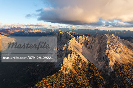 Aerial view of the rocky peaks of Latemar at sunset, Dolomites, South Tyrol, Italy