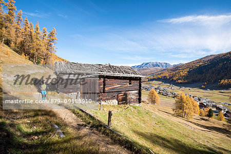 Hiker travelling on the track in Livigno, Province of Sondrio, Lombardy, Italy, European