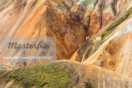 Trekkers are walking in Landmannalaugar (Fjallabak Nature Reserve, Highlands, Southern Region, Iceland, Europe)