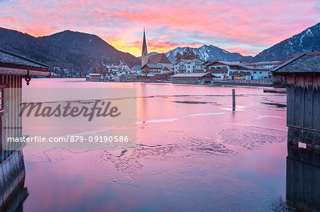 Winter sunrise in Rottach-Egern with the frozen Tegernsee Lake, District Miesbach, Upper Bavaria, Germany, Europe