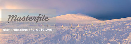 Panoramic of snow covered mountains at dusk, Pallas-Yllastunturi National Park, Muonio, Lapland, Finland