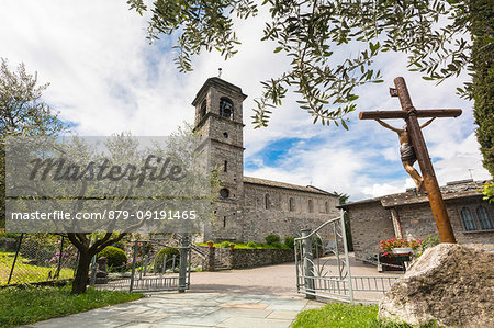 Bell tower and crucifix, Piona Abbey (Abbazia Priorato di Piona), Colico, Lecco province, Lombardy, Italy