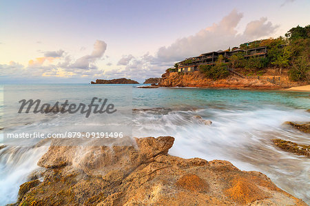 Sunset on waves of the rough sea, Galley Bay Beach, Antigua, Antigua and Barbuda, Caribbean, Leeward Islands, West Indies