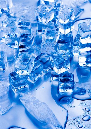 simsearch:400-03910344,k - Ice can refer any of the 14 known solid phases of water. However, in non-scientific contexts, it usually describes ice Ih, which is the most abundant of these phases in Earth's biosphere. This type of ice is a soft, fragile, crystalline solid, which can appear transparent or an opaque bluish-white color depending on the presence of impurities such as air. The manufacture and use of ice cubes or cr Stockbilder - Microstock & Abonnement, Bildnummer: 400-04004893