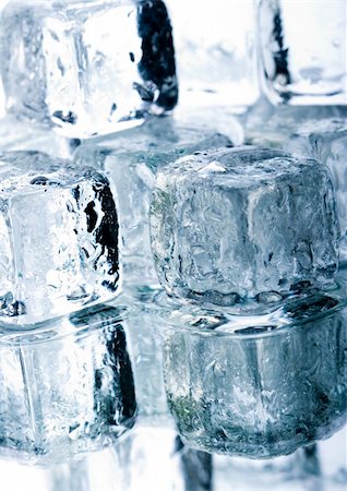 simsearch:400-03910344,k - Ice can refer any of the 14 known solid phases of water. However, in non-scientific contexts, it usually describes ice Ih, which is the most abundant of these phases in Earth's biosphere. This type of ice is a soft, fragile, crystalline solid, which can appear transparent or an opaque bluish-white color depending on the presence of impurities such as air. The manufacture and use of ice cubes or cr Stockbilder - Microstock & Abonnement, Bildnummer: 400-04004901