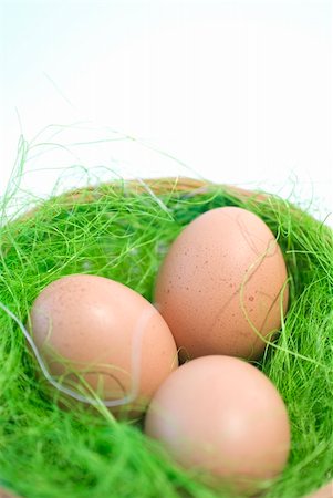 smithesmith (artist) - Easter eggs in a basket and green straw Stock Photo - Budget Royalty-Free & Subscription, Code: 400-04005388