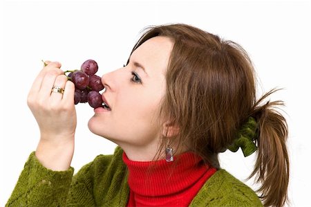 young girl is holding grapes in the palm Stock Photo - Budget Royalty-Free & Subscription, Code: 400-04005404