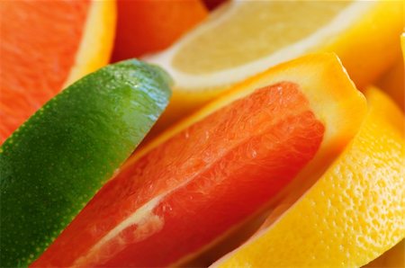 simsearch:400-04699407,k - Wedges of assorted citrus fruits lemon orange and lime Stock Photo - Budget Royalty-Free & Subscription, Code: 400-04005734