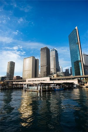 simsearch:400-04006297,k - Circular Quay Railway Station in Sydney Cove with view of downtown skyscrapers in Sydney, Australia. Foto de stock - Royalty-Free Super Valor e Assinatura, Número: 400-04006310