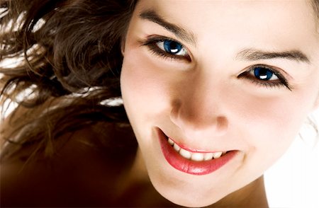 simsearch:400-03996893,k - Portrait of a young woman with beautiful blue eyes smiling Stock Photo - Budget Royalty-Free & Subscription, Code: 400-04006440