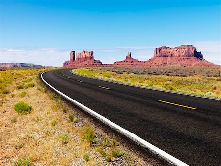 Road in scenic desert landscape with mesa and mountains. Stock Photo - Budget Royalty-Free & Subscription, Code: 400-04006510