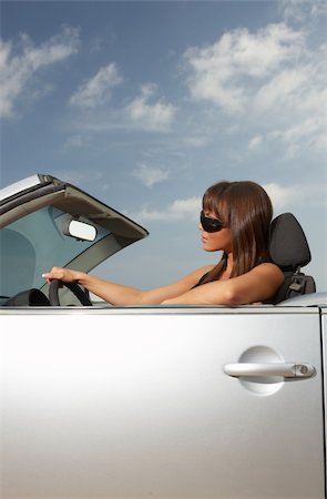 Woman and her cabriolet car at Fuerteventura's beach Stock Photo - Budget Royalty-Free & Subscription, Code: 400-04006775