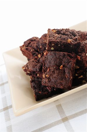 Homemade chocolate brownies served on a plate Stock Photo - Budget Royalty-Free & Subscription, Code: 400-04007213