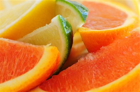 simsearch:400-04699407,k - Wedges of assorted citrus fruits lemon orange and lime Stock Photo - Budget Royalty-Free & Subscription, Code: 400-04007220