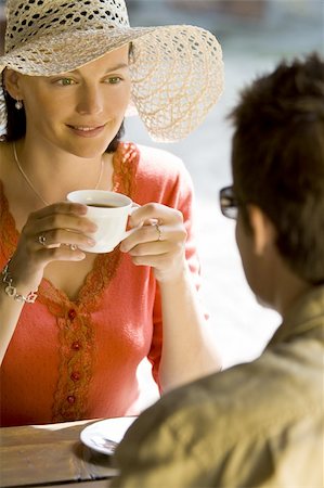 simsearch:400-04655736,k - A young couple enjoying a romantic cup of coffee with each other Stockbilder - Microstock & Abonnement, Bildnummer: 400-04007450
