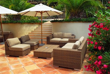 simsearch:400-04064749,k - Patio of mediterranean villa in French Riviera with wicker furniture Stock Photo - Budget Royalty-Free & Subscription, Code: 400-04008373