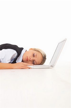 simsearch:400-04008684,k - Very tired Businesswoman sleeping on her laptop while lying down on the floor Stockbilder - Microstock & Abonnement, Bildnummer: 400-04008491