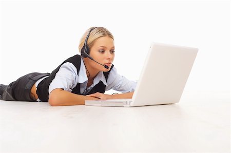 simsearch:400-04008684,k - Businesswoman working on her laptop while lying down on the floor Stockbilder - Microstock & Abonnement, Bildnummer: 400-04008684