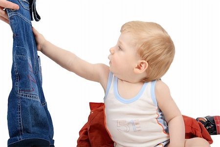 sergeitelegin (artist) - The beautiful little boy tries on clothes Stock Photo - Budget Royalty-Free & Subscription, Code: 400-04008760