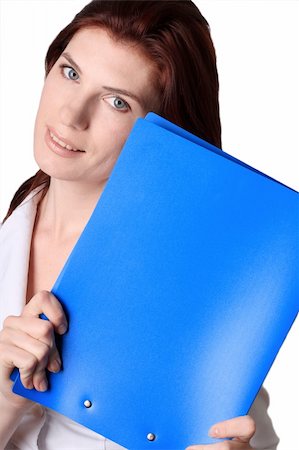 sergeitelegin (artist) - The beautiful young girl smiles with a dark blue folder in a hand Stock Photo - Budget Royalty-Free & Subscription, Code: 400-04008822
