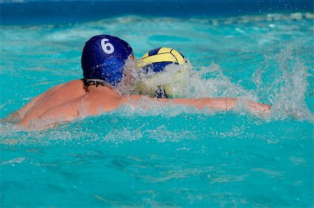 simsearch:400-04731600,k - Water polo player swimming for the ball Stock Photo - Budget Royalty-Free & Subscription, Code: 400-04008884