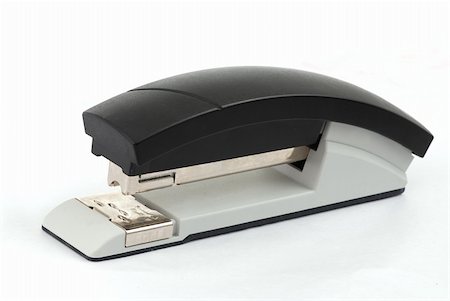 simsearch:400-06764562,k - Paper stapler macro isolated on the white background Stock Photo - Budget Royalty-Free & Subscription, Code: 400-04009606