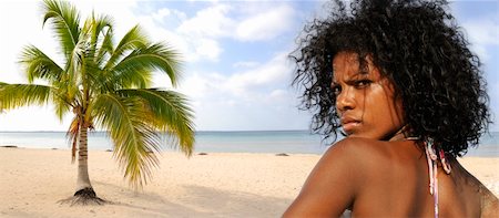 Panorama of tropical beach with young bikini model Stock Photo - Budget Royalty-Free & Subscription, Code: 400-04009907