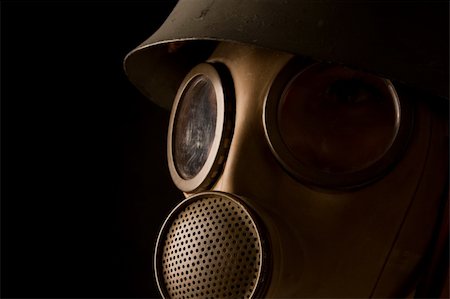 Person in gas mask on black background Stock Photo - Budget Royalty-Free & Subscription, Code: 400-04000064