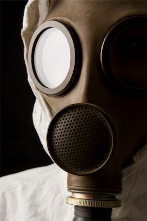 Person in gas mask on black background Stock Photo - Budget Royalty-Free & Subscription, Code: 400-04000063