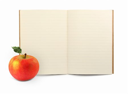 simsearch:400-04277882,k - lined exercise book and apple on white, visible shadow in front Foto de stock - Super Valor sin royalties y Suscripción, Código: 400-04000188