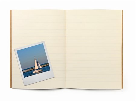 simsearch:400-05117367,k - blank lined exercise book and photo frame, gentle shadow in front, photo inside is my property, Stock Photo - Budget Royalty-Free & Subscription, Code: 400-04000182