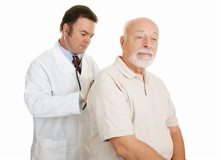 simsearch:400-05192324,k - Doctor examining senior man.  Both have serious expressions.  Isolated on white. Stock Photo - Budget Royalty-Free & Subscription, Code: 400-04000471